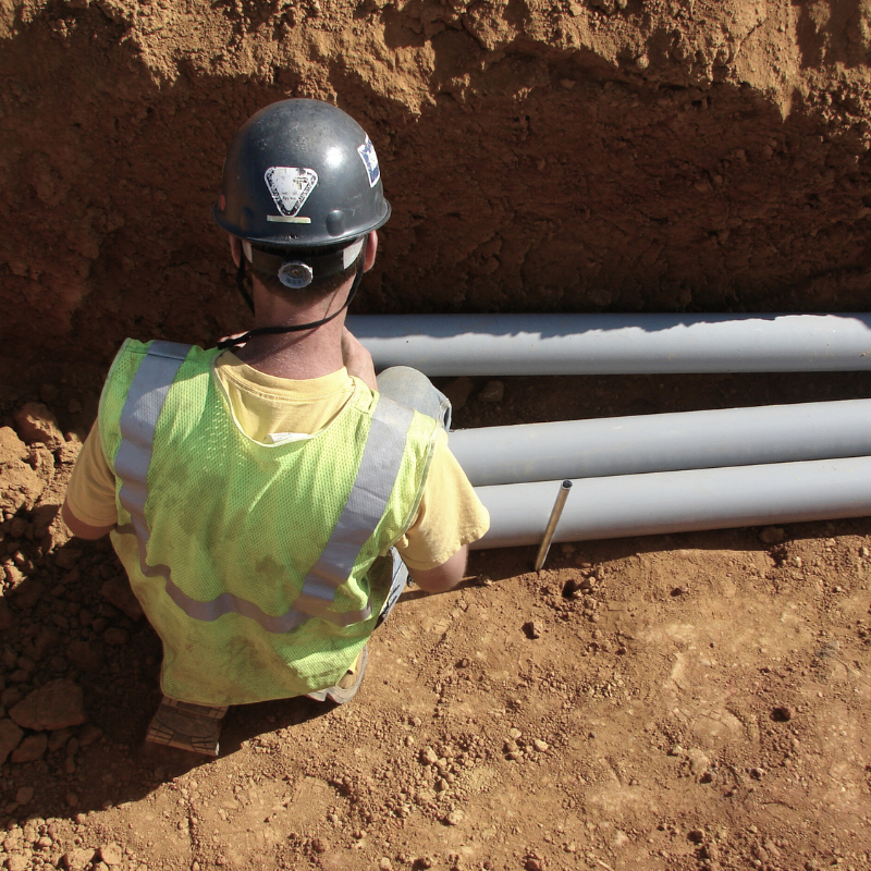 dennis electric team member working at construction site electrical underground laying